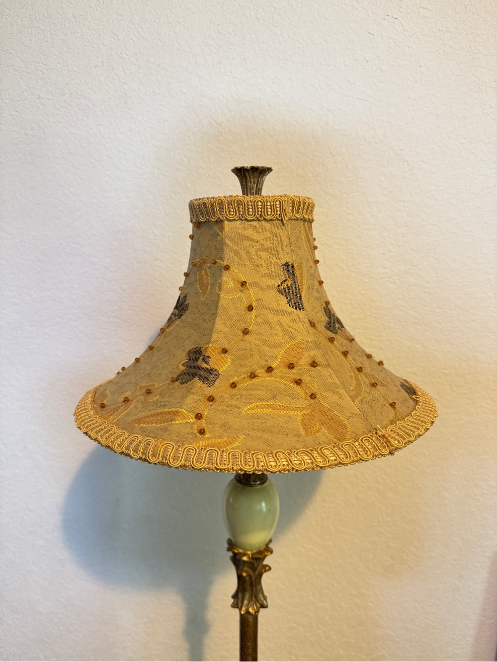 Vintage Bell lamp shade featuring an ornate design with golden lace fabric